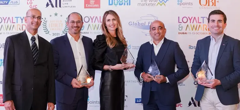 Loyalty Juggernaut team receiving the award in Dubai, 2021