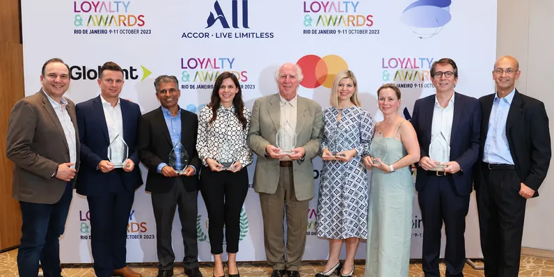 Loyalty Juggernaut team receiving the award in Rio de Janeiro, 2023